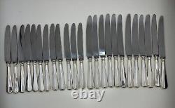 A Set Of 24 Sterling Silver Handled Table Knives In Two Sizes