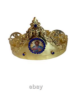 Golden Byzantine Orthodox wedding crowns set of two in Christian church