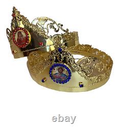 Golden Byzantine Orthodox wedding crowns set of two in Christian church