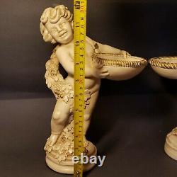 Set of two Universal Statuary Corp Chicago Boy With Bowl Statue grape leaves