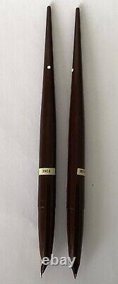 TWO 1960s SCHEAFFER WHITE DOT CARTRIDGE FILL DESK PENS WITH LEATHER STAND