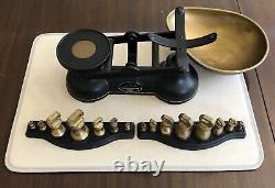 Traditional Salter black vintage kitchen scales with two sets of brass weights