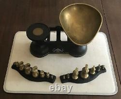 Traditional Salter black vintage kitchen scales with two sets of brass weights