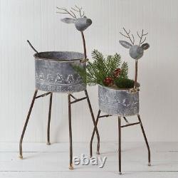 Ensemble de deux cache-pots en métal gris avec des rennes en métal : décoration de Noël.