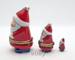 Ensemble de trois Père Noël gigognes, deux boîtes à bijoux françaises Limoges et une figurine